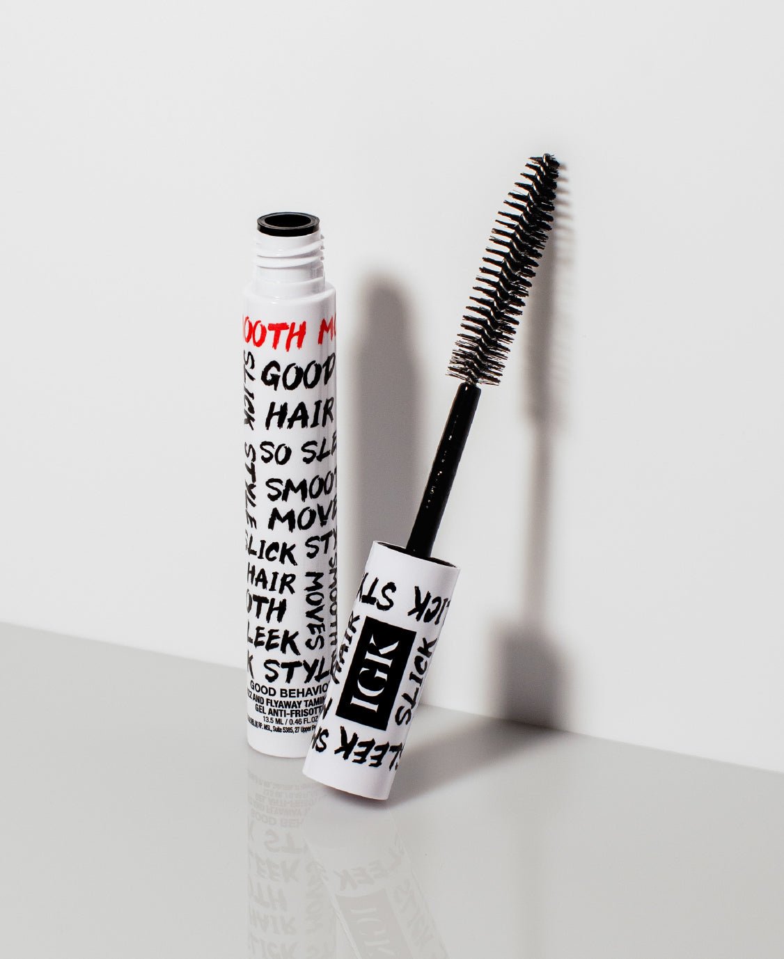 Taming wand brush on a white background