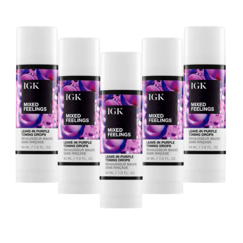 IGK Mixed Feelings leave-in purple toning drops bottles arranged in a row.