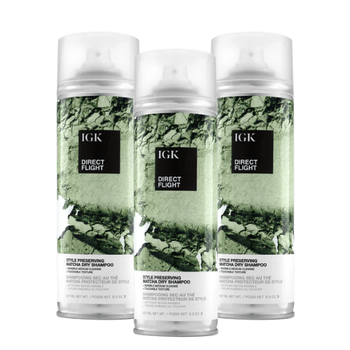Three cans of IGK Direct Flight Matcha Dry Shampoo.