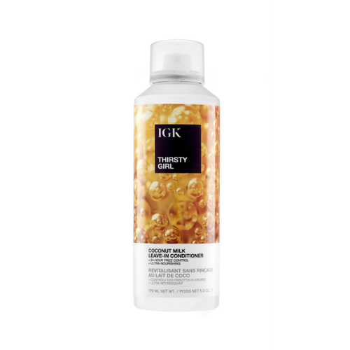 A bottle of IGK Thirsty Girl coconut milk leave-in conditioner.