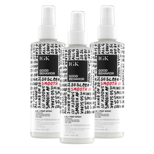 Three bottles of IGK Good Behavior 4-in-1 Prep Spray.