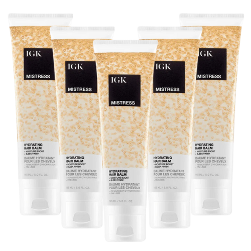 Five tubes of IGK Mistress Hydrating Hair Balm arranged in a group.