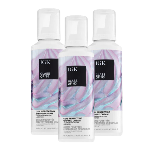 Three bottles of IGK Class of '93 Curl Perfecting Whipped Cream.