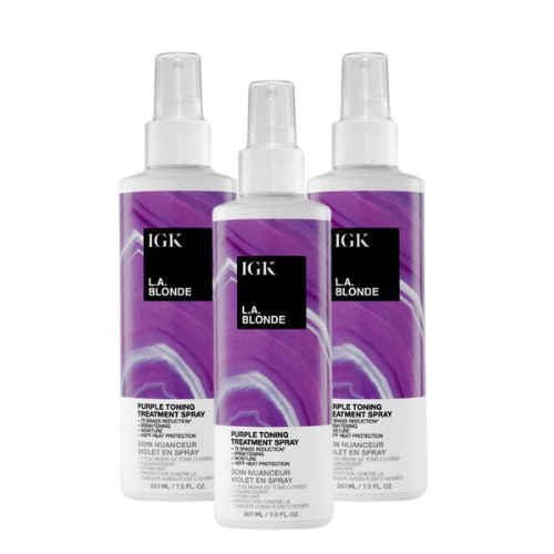 Three bottles of IGK L.A. Blonde purple toning treatment spray.