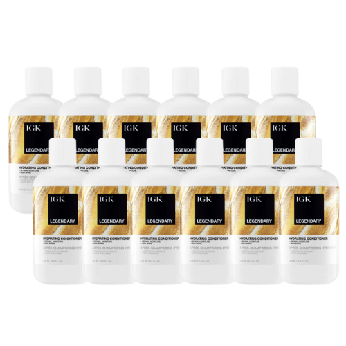 Ten bottles of IGK Legendary Hydrating Conditioner arranged in rows.