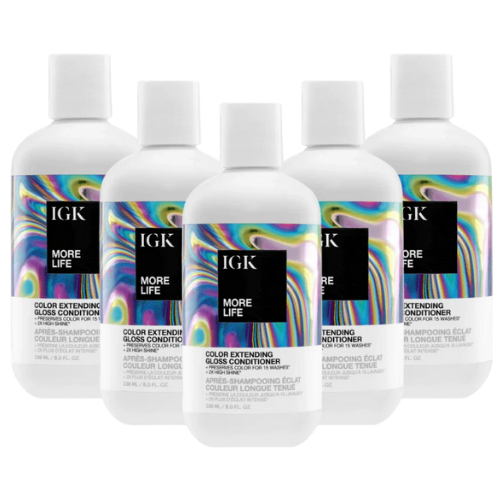 Five bottles of IGK More Life color extending gloss conditioner.