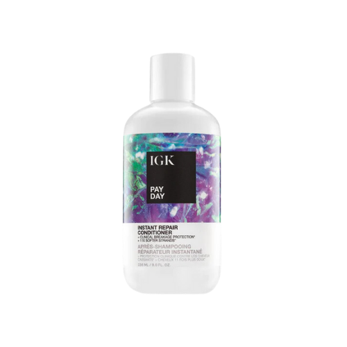 Bottle of IGK Pay Day Instant Repair Conditioner with colorful label design.