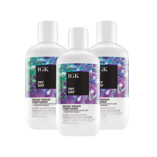 Three bottles of IGK Pay Day Instant Repair Conditioner.